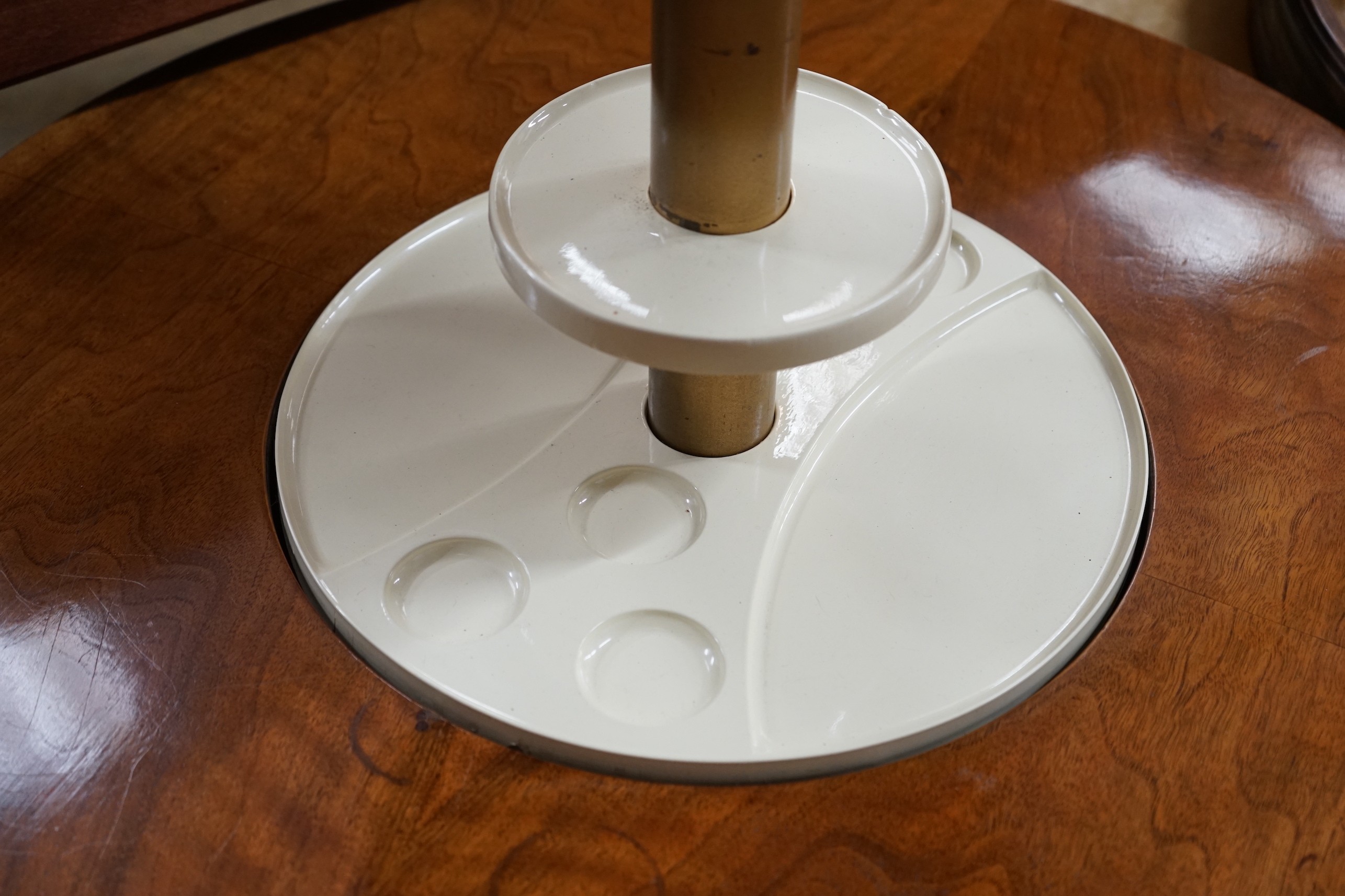 An Art Deco style circular walnut Patent Pop-up drinks table, diameter 80cm, length 92cm extended